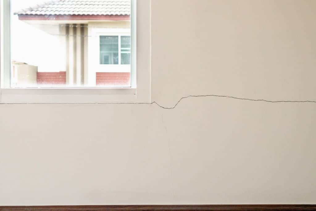 sinking foundation manifesting with cracks on the walls