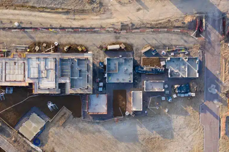 drone footage of concrete foundation for street buildings