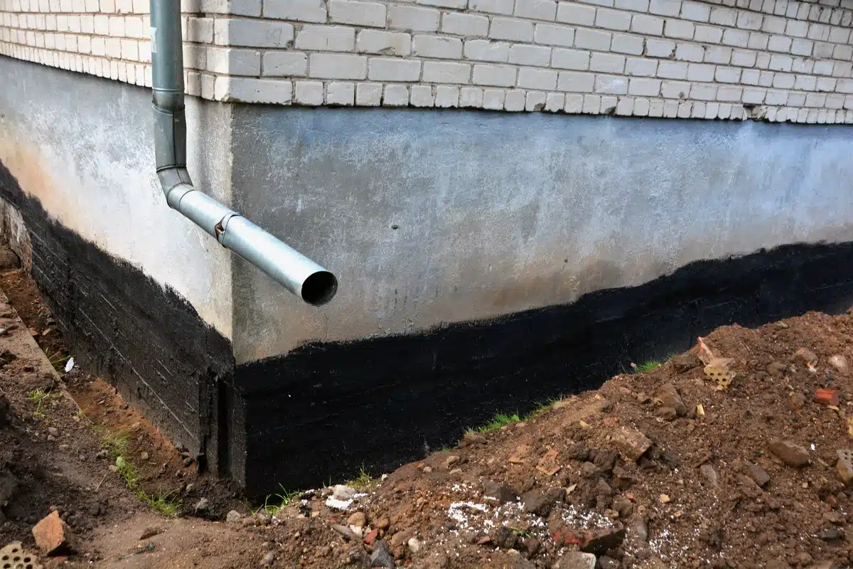 close up of building foundation before repairs